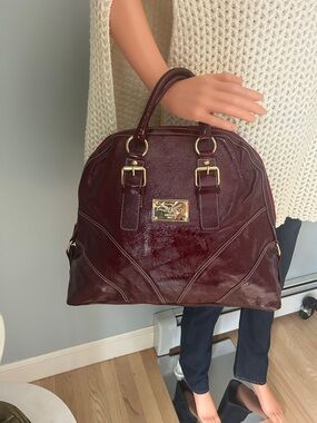 Guia’s 1964 Luxurious Oxblood Oversized Patent Leather Satchel
